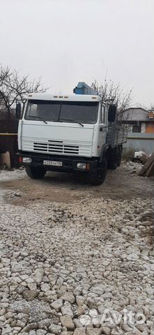 Манипулятор гружу вожу