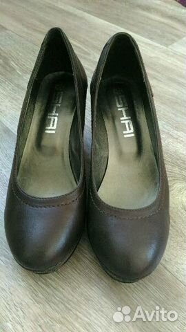 Новые кожаные туфли на танкетке Новые кожаные туфли на танкетке