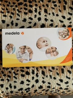 Молокоотсос medela ручной