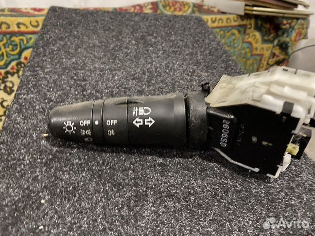 Переключатель поворотов Nissan Tiida