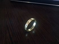 Продам обручальное кольцо с бриллиантами, 750