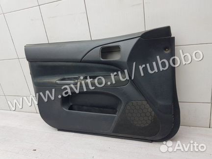 Обшивка двери передняя левая Mitsubishi Lancer 9